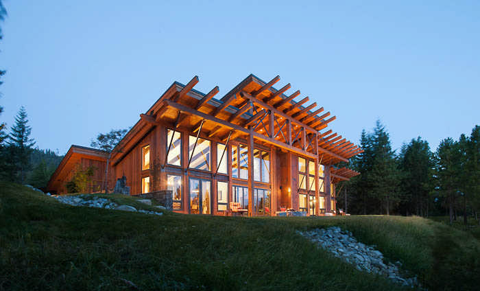 Modern design and rustic materials come together in this timber-framed 